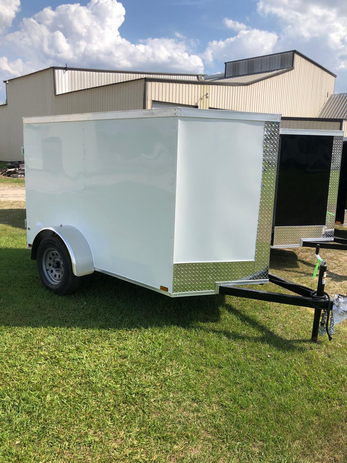 White Enclosed Cargo Trailer with a Single Axle